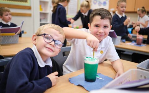Two male pupils in a classroom